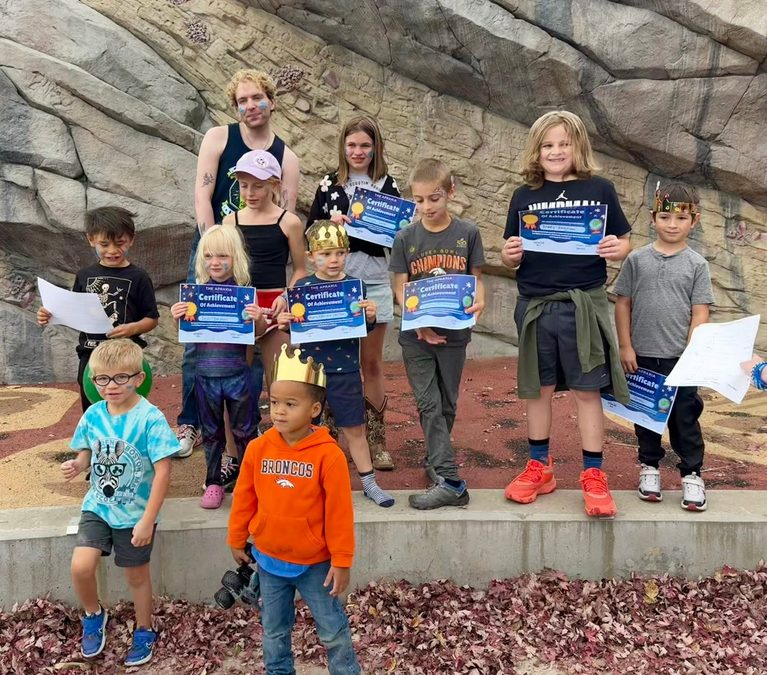 Children getting their certificates at the Apraxia festival